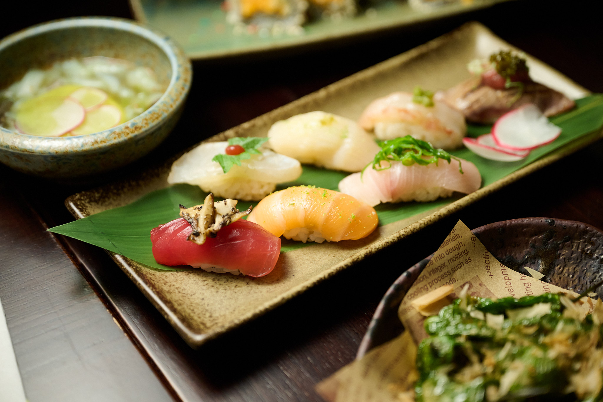 Premium nigiri sushi platter with Japanese soup and shishito peppers — perfect sake pairing at Showa Era