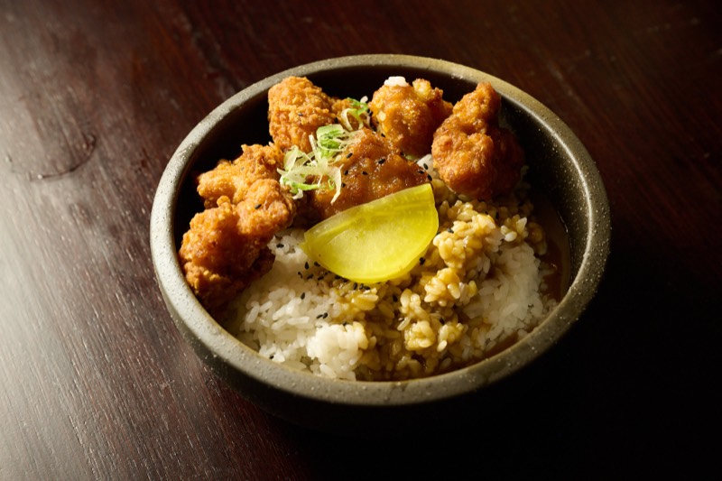 Japanese karaage fried chicken rice bowl with pickled radish at Showa Era
