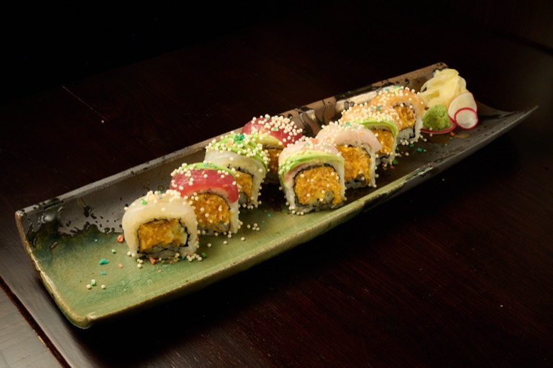 Colorful rainbow signature roll with tobiko at Showa Era Japanese restaurant