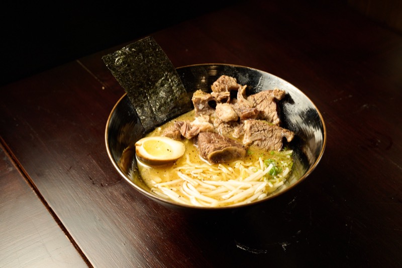 Rich tonkotsu ramen with chashu pork nori and soft egg at NYC ramen restaurant