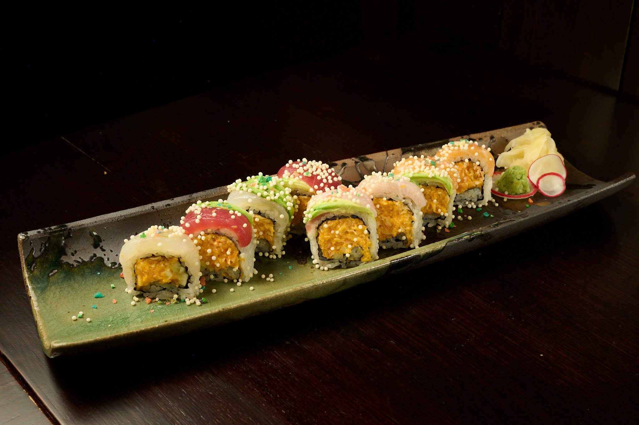 Colorful signature crunch roll with tobiko pearls and avocado at Showa Era Izakaya NYC