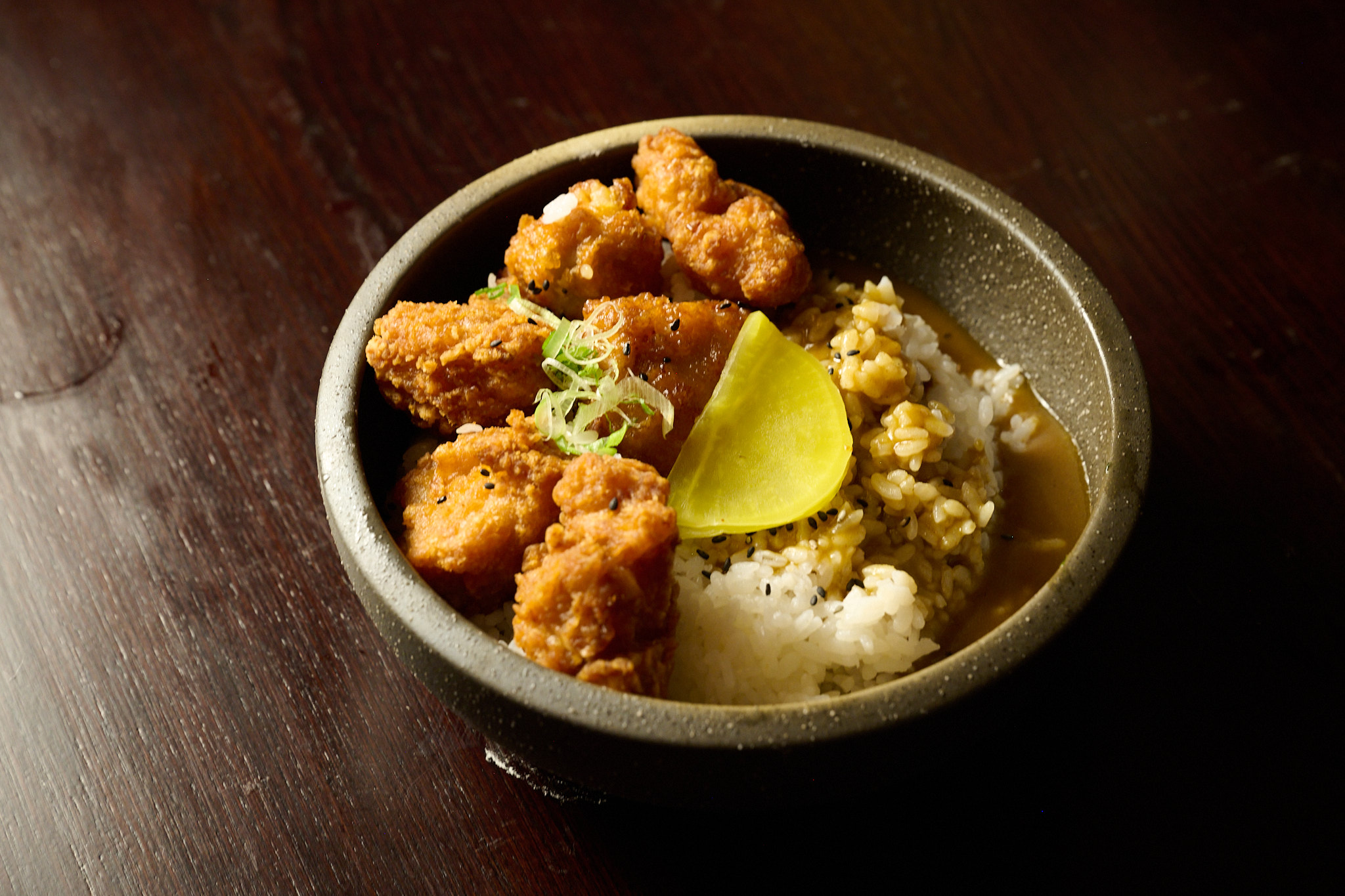Crispy karaage don rice bowl with lemon and sesame at Showa Era Izakaya NYC