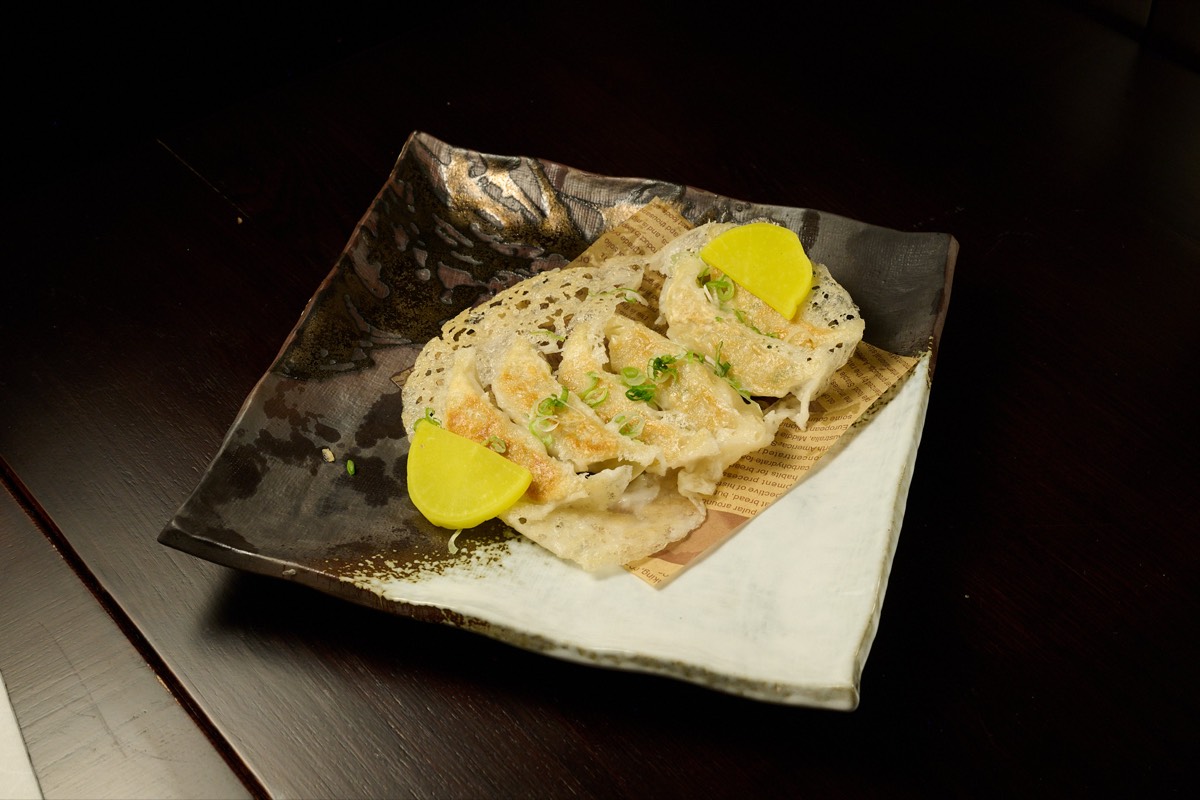 Traditional maki sushi roll with fresh fish at Hell's Kitchen Japanese restaurant